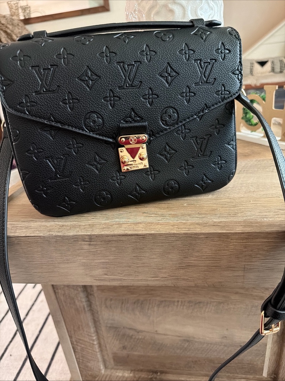 Louis Vuitton Black Monogram Embossed Crossbody with Gold Hardware
